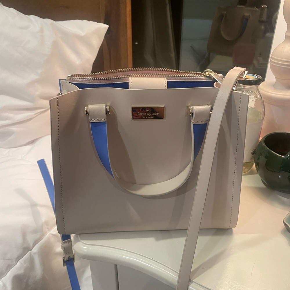 Kate Spade Cream and Purple Satchel with Modern Design
